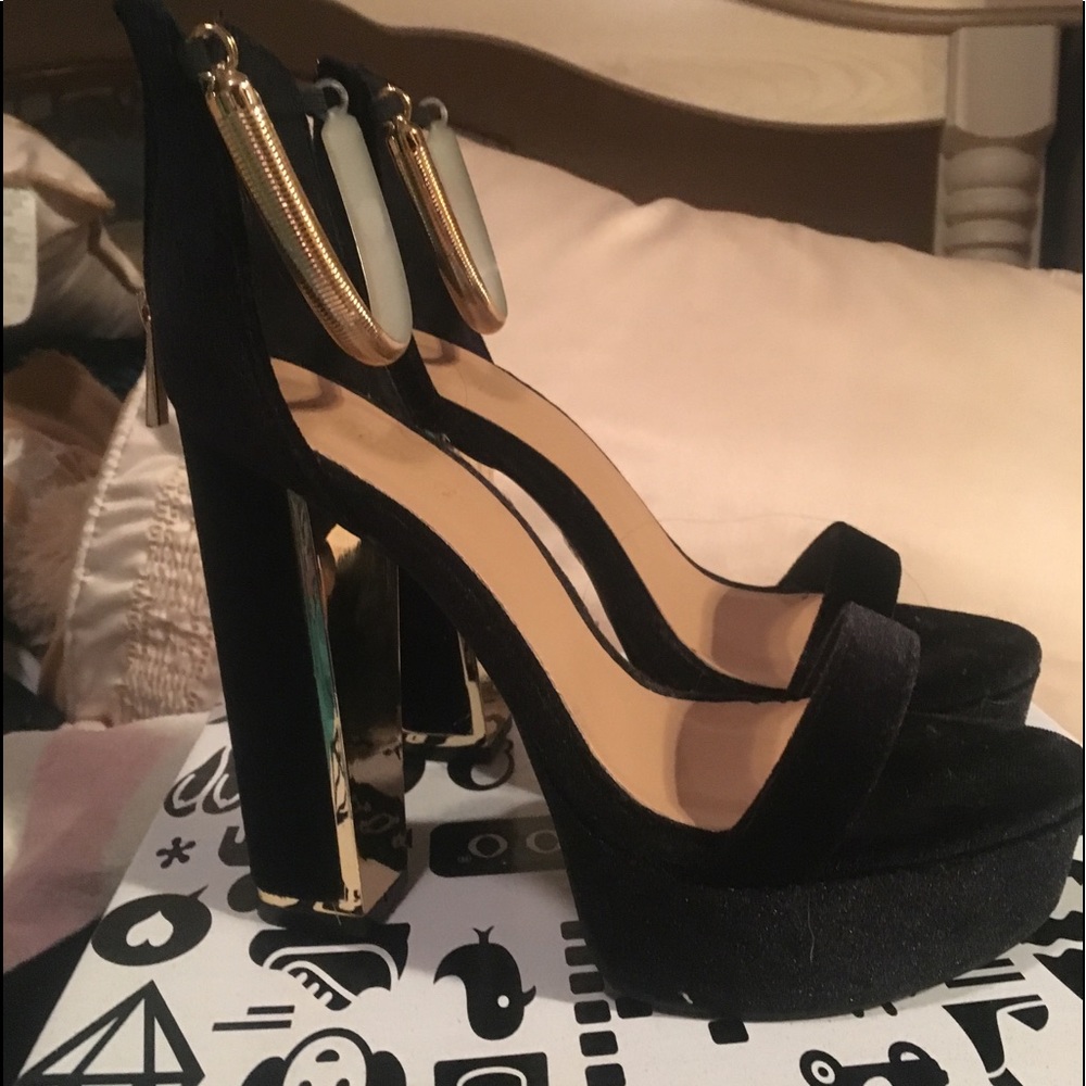 Black and gold heels